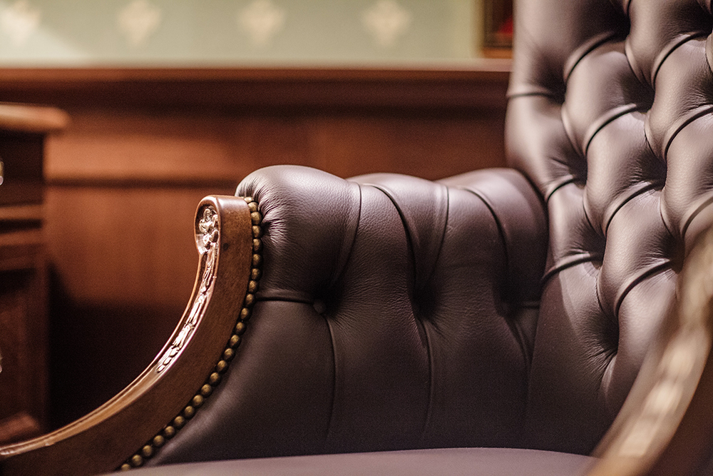 Brown leather chair.